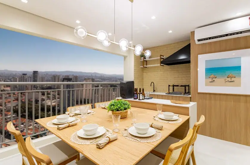 Terraço com churrasqueira a carvão do apto. de 118m² · Foto do decorado